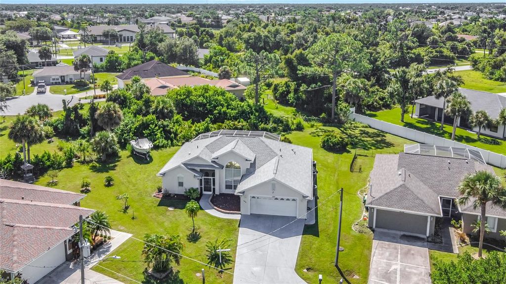 Photo of 145 Spur Drive, Rotonda West, FL 33947 (MLS # D6140886)