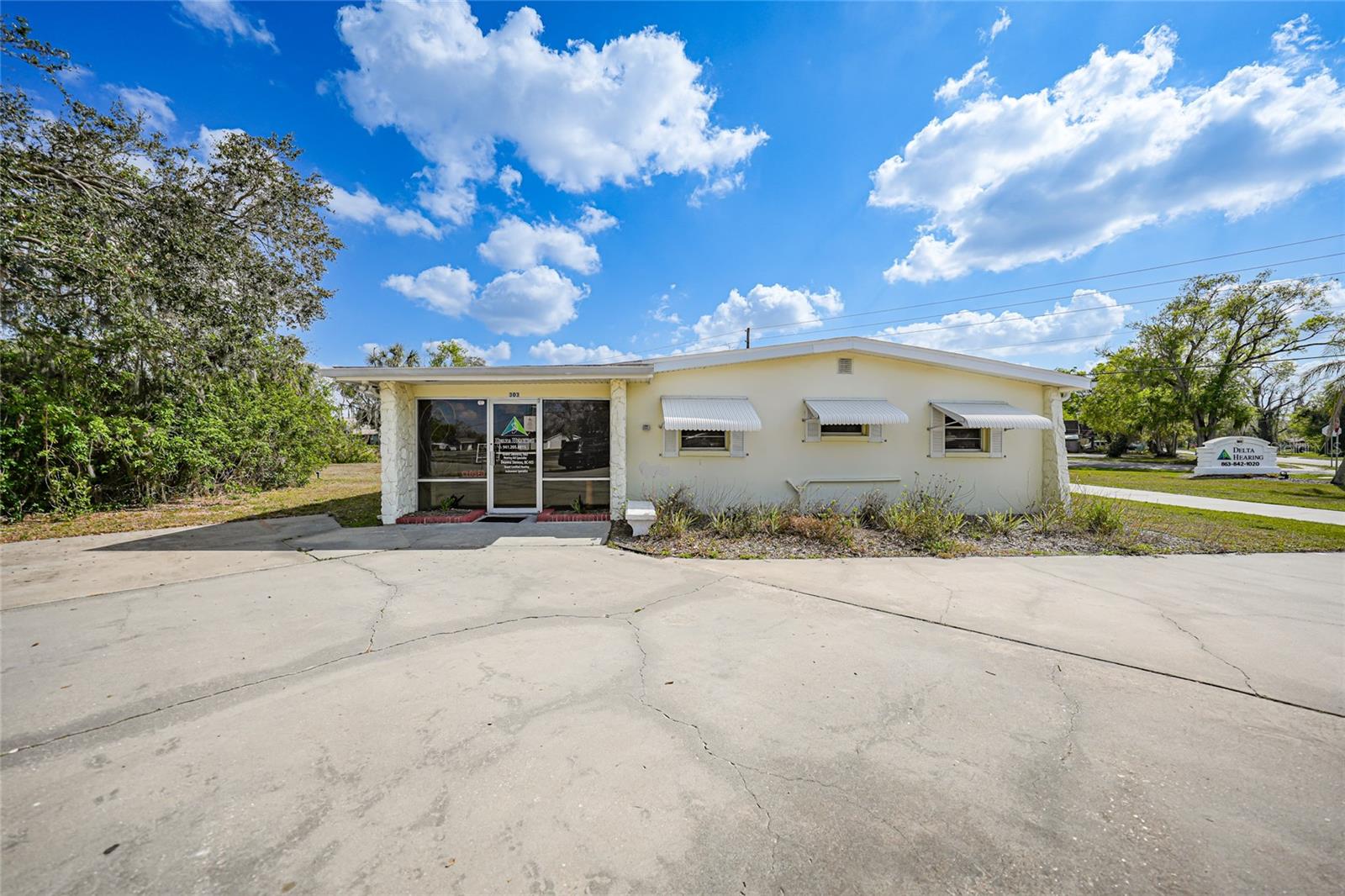 Prime medical office space in the heart of the medical district! This highly desirable corner lot is just steps from DeSoto Memorial Hospital and surrounded by a network of established medical offices, making it an ideal location for healthcare professionals looking to grow their practice or savvy investors seeking a turnkey income-generating property. Step inside to find a well-designed layout that balances functionality and comfort. The welcoming waiting room creates a professional first impression, while the dedicated receptionist area ensures smooth day-to-day operations. With three private patient rooms, this space is well-suited for a variety of medical, therapy, or wellness practices. Plus, the kitchen and dining area provides a convenient spot for staff breaks, meal prep, or even additional workspace. One of the standout features of this property is the extra private room with second bathroom that is currently rented out, offering immediate passive income or the flexibility to expand your own practice. The entire office has been recently updated and meticulously maintained, so there’s no need to worry about costly renovations—just move in and get to work. Whether you’re looking for a strategic location to serve patients, a property with built-in rental income that exceeds $2,500/month, or an investment that will continue to appreciate, this medical office is a smart buy. Don’t miss out on this rare opportunity—schedule your showing today!