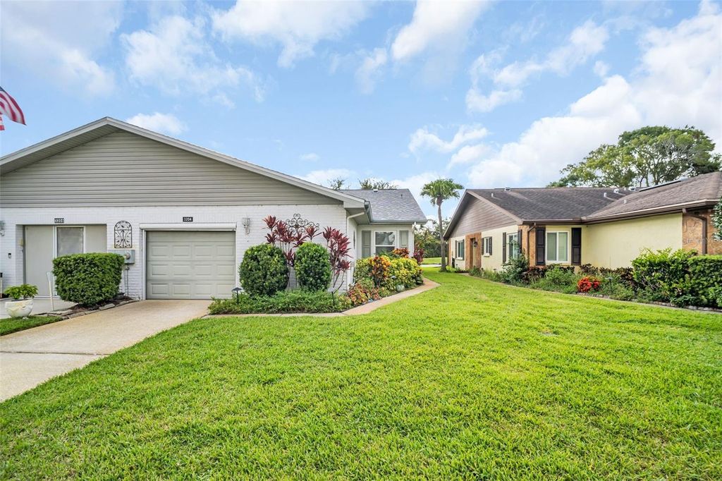 Photo of 3204 Mcmath Drive, Palm Harbor, FL 34684 (MLS # TB8408700)