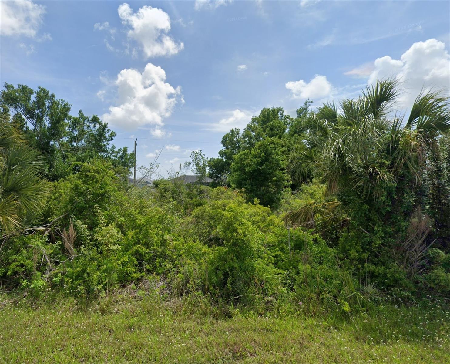 Endless possibilities on Claremont Drive! Ideally situated in Port Charlotte, this property offers flexibility and opportunity. Even better – the adjacent lots are also available, giving you the option to purchase individually or as a package. Perfect for individuals, builders, or investors looking for multiple side-by-side lots! Tee off 1 mile from Claremont at The Cove of Rotonda Golf Center. You’ll also be close to Fishermen’s Village with waterfront dining and boutique shops, festivals, and parades! Port Charlotte Town Center for convenient shopping and restaurants. Spend the day at the new Sunseeker Resort with a day pass to enjoy two resort pools, or stop in for world-class dining, amazing sports bar, Italian, seafood, or the food court without a pass. Outdoor lovers will appreciate quick access to Port Charlotte Beach Park, Stump Pass Beach State Park, public boat ramps, and endless opportunities for paddle boarding and kayaking. Sports fans will love the proximity to Charlotte Sports Park, spring training home of the Tampa Bay Rays, as well as CoolToday Park, the spring training facility for the Baltimore Orioles.
Whether you’re looking to build your dream home, create an investment property, or secure multiple parcels for future development, this opportunity offers location, flexibility, and lifestyle! Adjacent lots available: A4662883, A4662884, A4662885, A4662886.