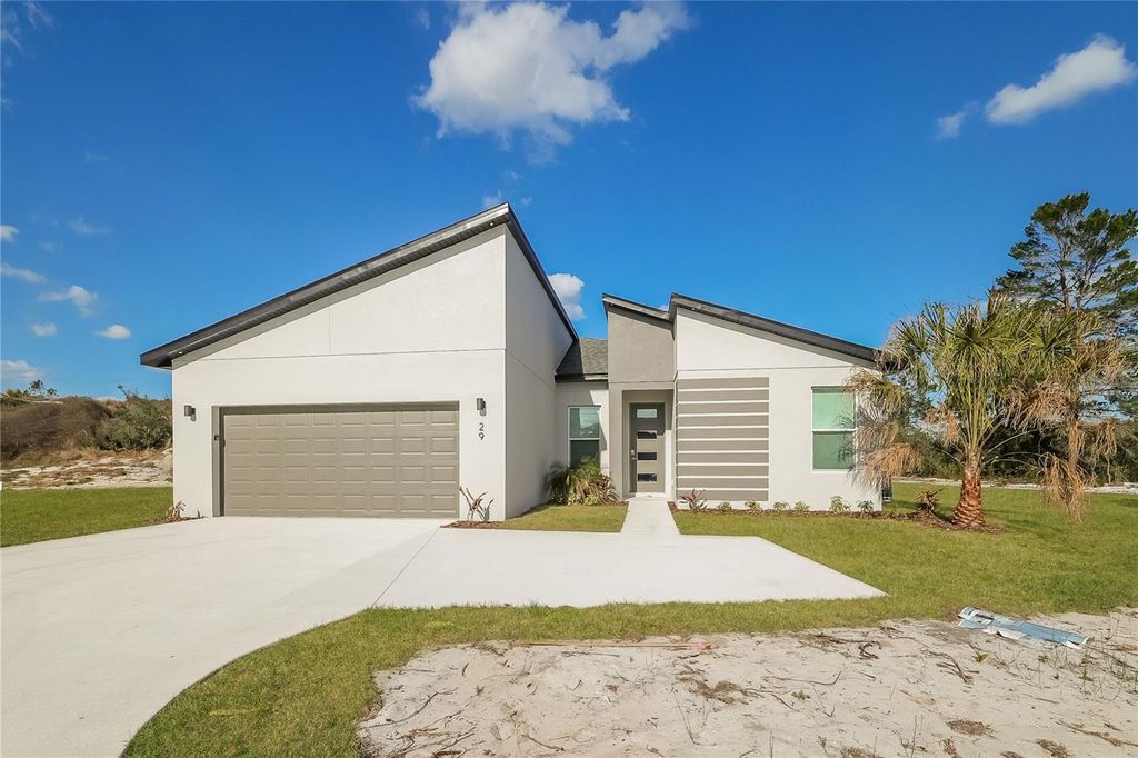 Photo of 29 Orchid Court, Kissimmee, FL 34759 (MLS # TB8502253)