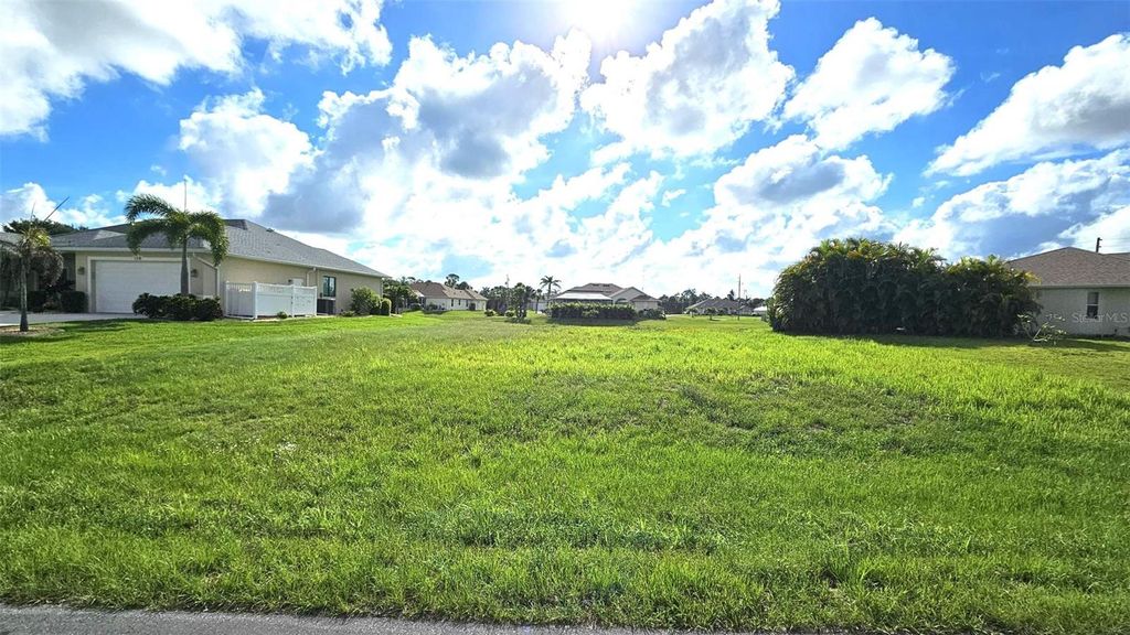 Photo of 144 Long Meadow Lane, Rotonda West, FL 33947 (MLS # D6147645)