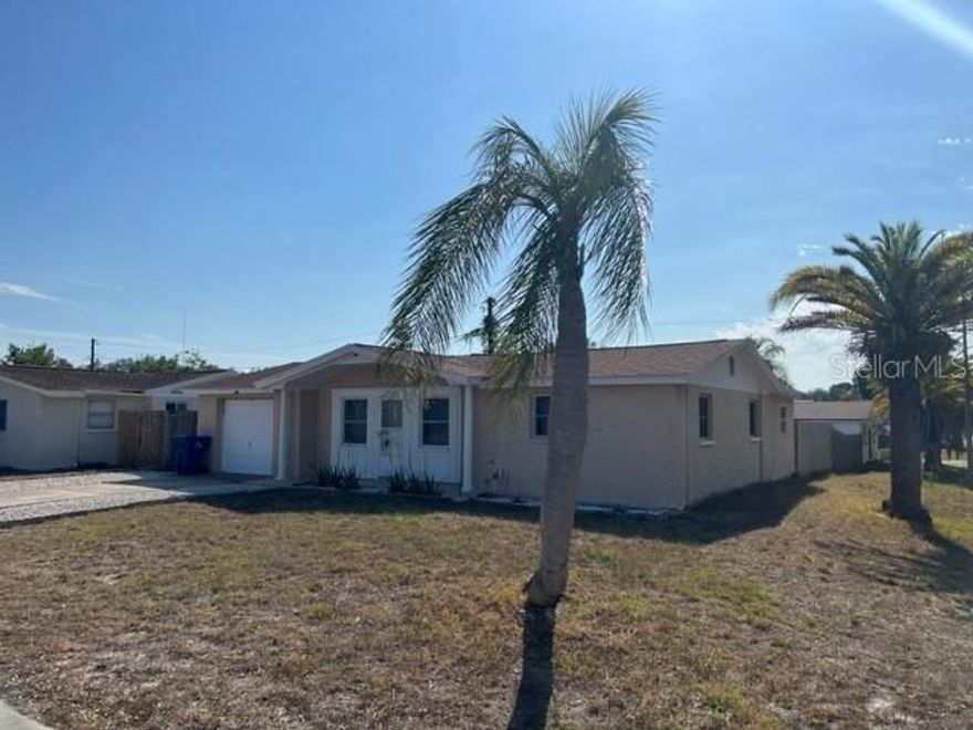 Beautiful porcelain floors throughout this 3 bedroom 2 bath home with 1 car garage with laundry.  Nice kitchen, decent bathrooms, charming split bedroom setup. Pets ok as we have a fenced in yard - looking to lease asap.