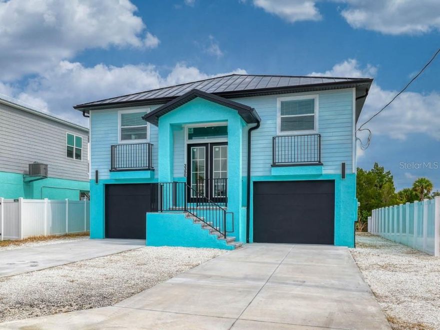 One or more photo(s) has been virtually staged. MOVE IN READY, NEW CONSTRUCTION HOME WITH STUNNING WATER VIEWS & BUILDER WARRANTY!
Experience the perfect blend of coastal charm and modern elegance in this open-concept 3 bedroom, 2 bath split floor plan home designed for the waterfront lifestyle. Every detail has been thoughtfully upgraded—from luxury vinyl plank floors, impact windows and doors, quartz countertops with a waterfall island, crown moulding, durable Hardie board siding and 26 GA standing steam metal roof.
The gourmet kitchen is a showstopper, featuring stainless steel smart appliances, an electric range with hood vent, built-in double oven/microwave, ceiling-height cabinetry, an eat-in island with wine fridge, and gorgeous quartz surfaces. The kitchen flows seamlessly into the bright living room with slider access to the balcony, while the front room serves as a dining area or easily converts to a flex space.
The primary suite offers his-and-hers closets, private porch access, and an en-suite bath with a double vanity, backlit mirror, and a glass-enclosed shower. Two oversized guest bedrooms share a stylish bath with a tub/shower combo, raised sink vanity, and light-up mirror.
An interior staircase leads to the expansive first level, providing parking for 4+ vehicles, a game room, workshop, or endless possibilities—enhanced by large windows and dual sliders for abundant natural light.
Outside, the spacious backyard offers plenty of room for a future pool, features a concrete seawall, and is xeriscaped for low maintenance. Estimated homeowner's insurance for owner-occupants is just 1,241 dollars per year thanks to its new construction status.Only a short trip to Hernando Beach boat lift which offers access to the Gulf

Hernando Beach is a vibrant waterfront community that offers the best of coastal living—boating, kayaking, paddleboarding, fishing, and more. Just minutes from the world-famous Weeki Wachee Springs, residents also enjoy close proximity to shopping, dining, and hospitals. The community is golf cart friendly and allows short-term rentals with no HOA, no deed restrictions, making it perfect for full-time residents, part-time snowbirds, or investors. The Suncoast Parkway offers easy commuting to Tampa, Brooksville, and beyond. This is your chance to own a piece of paradise with unlimited potential and jaw-dropping views.