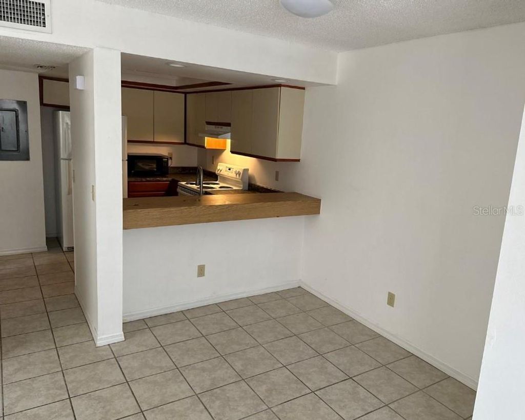 Photo of 3112 Sir Hamilton Circle #1, Titusville, FL 32780 (MLS # O6373752)