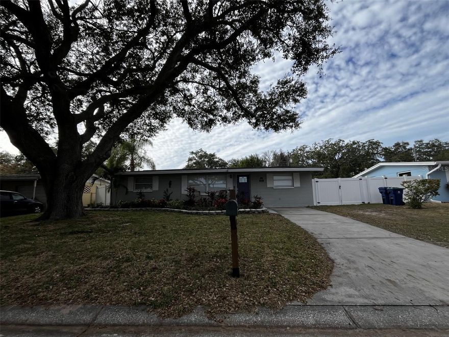 Welcome home to this beautifully updated 3-bedroom, 2-bath rental in Largo, offering comfort, space, and an unbeatable location. Designed with a desirable split-bedroom floor plan, this home features an open-concept kitchen and living area enhanced by soaring volume ceilings, creating a bright and airy atmosphere perfect for everyday living and entertaining. The modern kitchen is equipped with stainless steel appliances and solid surface countertops, seamlessly flowing into the living space. Both bathrooms have been tastefully upgraded, with the primary suite featuring a stand-up shower, while the secondary bathroom offers a relaxing bathtub. Step outside to a large, fully fenced backyard that truly sets this home apart. A private gate provides direct access to the Pinellas Trail, ideal for biking, walking, or jogging. The backyard also includes a gazebo, a large storage shed, and a double-gated entrance with ample space for boat or camper parking. The spacious screened-in patio is the perfect retreat to unwind and enjoy Florida living year-round. Ideally located just minutes from Seminole City Center Entertainment District, Walsingham Park, and the stunning Gulf beaches, this home offers both convenience and lifestyle. Don’t delay—schedule your appointment today and experience all this exceptional home has to offer!