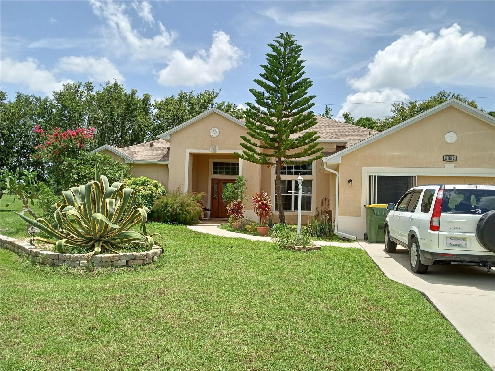 Welcome to 5352 Treasure View Way! This beautifully maintained 3 bedroom, 2 bathroom home, offering over 2,000 sqft. of open and airy living space tailored for comfort and ease. Nestled on a spacious 0.28-acre lot, this home features a light-filled living area, a modern kitchen with plenty of counter space, a screened-in lanai perfect for morning coffee or evening relaxation, and an attached 2-car garage. Located in the sought-after 55+ community of Legacy of Leesburg, residents enjoy access to walking trails, resort-style amenities, and a vibrant social atmosphere. Whether you're looking for a full-time residence or a seasonal retreat, this home blends functionality with Florida charm. Schedule your private tour today.