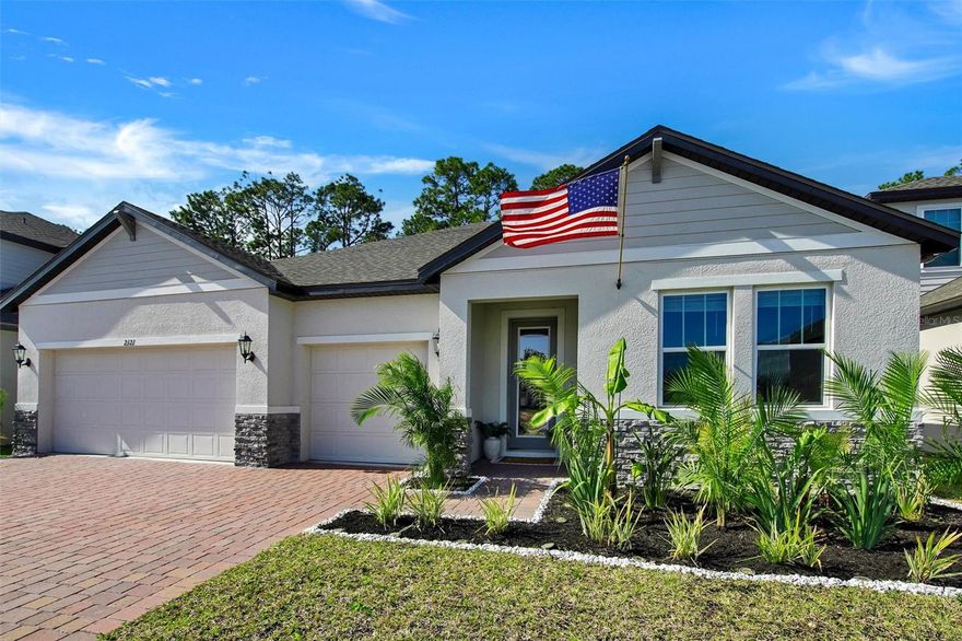 Welcome to this beautifully maintained 2025-built home in the Legends Preserve community of Daytona Beach. Offering 4 bedrooms, 3 bathrooms, and over 2,700 square feet of thoughtfully designed living space, this residence also features a 3-car garage, combining space, style, and modern convenience.

The open-concept floor plan is ideal for both everyday living and entertaining. The chef’s kitchen features modern cabinetry, stainless steel appliances, a large center island, and a spacious walk-in pantry with a dedicated coffee nook, creating a functional and inviting hub of the home. Natural light fills the main living areas through expansive windows and sliding doors that open to the backyard—perfect for enjoying Florida’s outdoor lifestyle.

The primary suite offers a peaceful retreat, highlighted by a custom-built wardrobe system in the walk-in closet designed for exceptional organization and storage. One of the home’s most convenient features is the large laundry room that connects directly to the primary closet, making daily routines effortless. The en-suite bathroom includes dual vanities and a walk-in shower. A flexible fifth room has been thoughtfully designed as a custom-built home office, ideal for remote work, study, or a quiet creative space.

Outside, the property has been enhanced with upgraded landscaping, adding to the home’s curb appeal and welcoming presence.
Located in the desirable LPGA International area, Legends Preserve offers a peaceful setting with convenient access to I-95, I-4, Daytona International Airport, Tanger Outlets, golf courses, dining, and the beaches. Combining newer construction with thoughtful custom upgrades, this move-in ready home presents a rare opportunity to enjoy refined living in one of Daytona Beach’s most sought-after communities.

All information is believed to be accurate but should be independently verified.