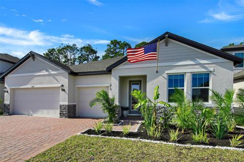 Photo of 2121 Divot Drive, Daytona Beach, FL 32124 (MLS # NS1087610)