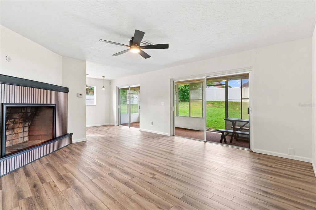 Photo of 1441 NE Old Mill Drive, Deltona, FL 32725 (MLS # O6427628)