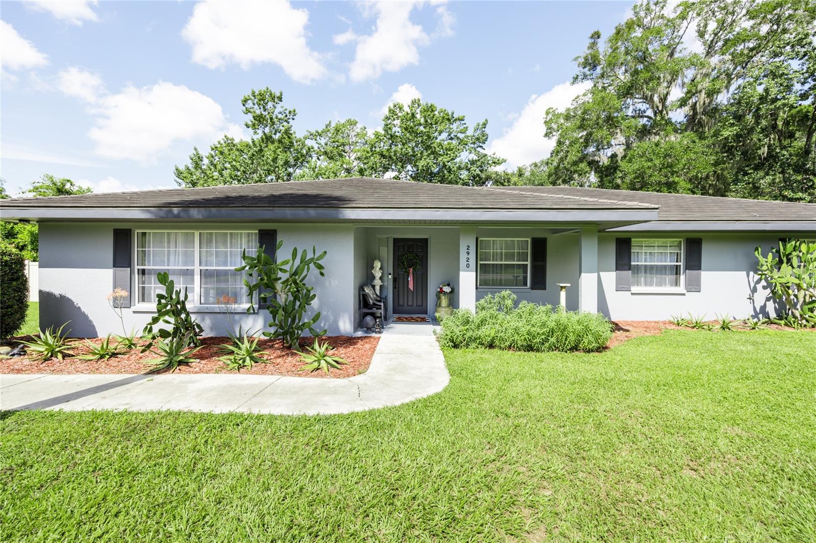 Wonderful Glen Springs Road Estate home with Pool. Located in a community with NO HOA. This is a private oasis situated on .91 of an acre. The home is concrete block and has been meticulously maintained and constantly upgraded. Right down to the brand new LVP floors! Upgrades recently added include insulation in the attic (blown in 12 inches) done in 2024, new pec piping throughout, new 200 Amp electrical panel, new ceiling fans & fixtures, new HVAC, and new windows. With a metal roof and concrete block construction this home is built to last. Enjoy the pool and backyard with game room and or shop.It is an open floor plan with a large kitchen and fire place in the Family Room. Enjoy a large lot in the middle of Gainesville close to everything. Best of all Bring Your RV or Boat. RV hook up in the yard, and boat parking. The backyard is fully fenced and everything on this home is truly turn key.