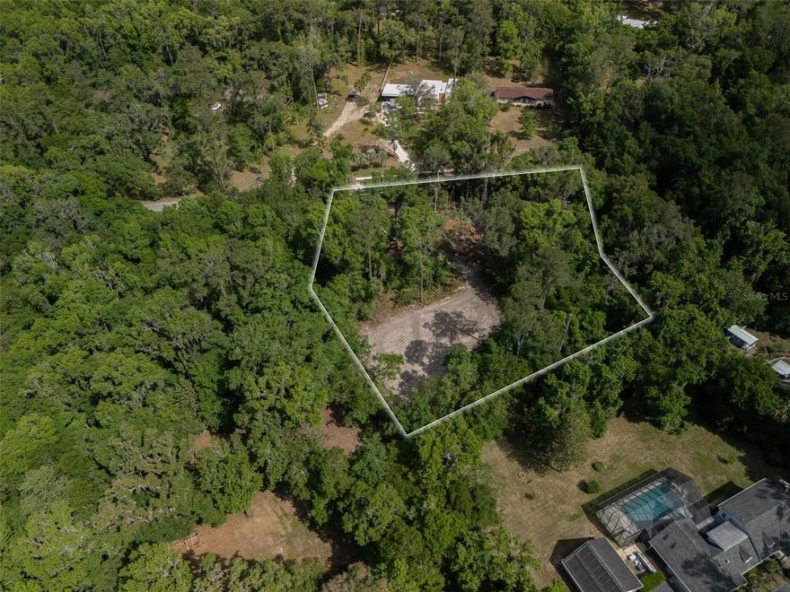 * * * Build Your Dream Home on 2.13 Acres in SW Gainesville * * * 

Discover a rare opportunity to create your ideal home on this stunning 2.13-acre parcel in the highly regarded Kirkwood neighborhood ~ ~ 
Enjoy the best of both worlds—a private, peaceful setting just minutes from Downtown Gainesville, The University of Florida, UF Health/Shands, Depot Park, and the area’s most vibrant dining, shopping, and cultural activities ~ ~ The high-and-dry homesite is free from HOA restrictions, giving you the flexibility to select your own builder and bring your vision to life exactly as you imagine ~ ~ Professional groundwork has already been completed, including a striking culvert over Tumblin Creek, providing a dramatic and welcoming entrance. With much of the major preparation done, you’ll save valuable time, money, and effort ~ ~ 

Whether you’re ready to start building now or planning for the future, this property offers a truly exceptional chance to craft the lifestyle you’ve been waiting for