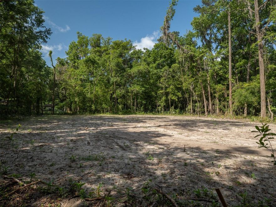 2.13 Acres IN~TOWN ~ OPEN BUILDER ~ NO HOA ~ NEAR UF, SHANDS & VET SCHOOL ~ 
The high-and-dry homesite is free from HOA restrictions, allowing you to choose your own builder and bring your vision to life without limitation. Whether you envision a private estate or dividing the parcel to create multiple homesites, the possibilities here are exceptional ~ 

A rare and compelling opportunity awaits in the highly regarded Kirkwood neighborhood—2.13 acres ~ 

Tucked into a peaceful, natural setting, this property delivers the best of both worlds: a serene retreat just minutes from Downtown Gainesville, the University of Florida, UF Health Shands, the Veterinary School, Depot Park, and a vibrant mix of dining, shopping, and cultural destinations.
. ~

Significant groundwork has already been completed, including the installation of a striking culvert crossing over Tumblin Creek—creating a distinctive and welcoming approach. With key improvements in place, valuable time, cost, and effort have already been invested for you. ~ 

Whether you're ready to build now or planning for the future, this property offers a unique opportunity to design and create something truly special in one of Gainesville’s most desirable locations.