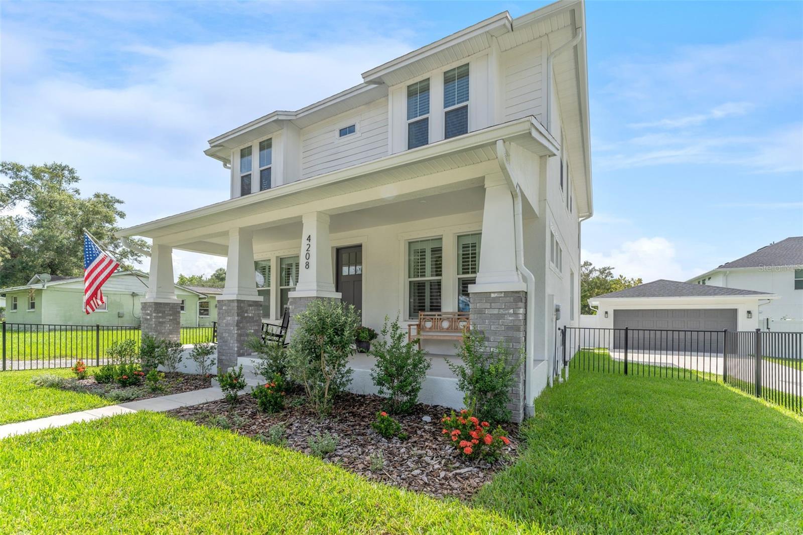 Welcome to this almost brand-new Domain Home, nestled in the vibrant Seminole Heights area of Tampa! This stunning 5-bedroom, 3-bathroom residence offers 2,327 square feet of beautifully designed living space, brimming with upgrades. Step inside and be greeted by an airy, open floor plan that bathes in natural light. The heart of the home is a spacious living area that seamlessly flows into a modern kitchen, complete with top-of-the-line appliances and ample counter space. The main floor also features a guest bedroom with an adjacent bathroom and a private office, perfect for remote work or study. Each of the five bedrooms is generously sized, offering a private retreat for everyone. The primary suite, located on the second floor, is a true sanctuary with a spacious ensuite bathroom featuring double sinks, a large shower, and a huge closet. The additional three bedrooms and the laundry room are also conveniently located upstairs. Step outside to your personal oasis! The backyard is a show stopper with a gorgeous pool surrounded by professional landscaping, creating an ideal backdrop for outdoor gatherings or tranquil evenings under the stars. This home is a perfect blend of luxury and comfort, waiting for you to make it your own. Don’t miss out on this incredible opportunity to own a piece of paradise in highly sought-after Seminole Heights.