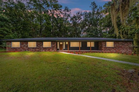 Photo of 9310 NW 10th Place, Gainesville, FL 32606 (MLS # OM710404)