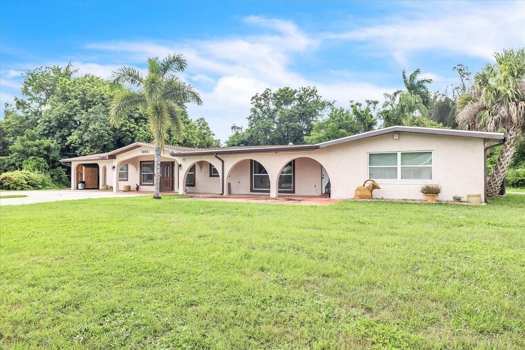 Photo of 1655 Daniels Drive, North Fort Myers, FL 33917 (MLS # C7527621)