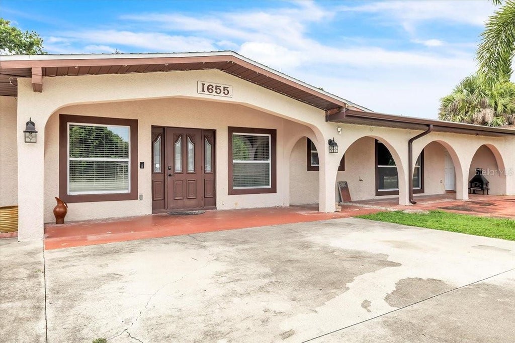 Photo of 1655 Daniels Drive, North Fort Myers, FL 33917 (MLS # C7527621)