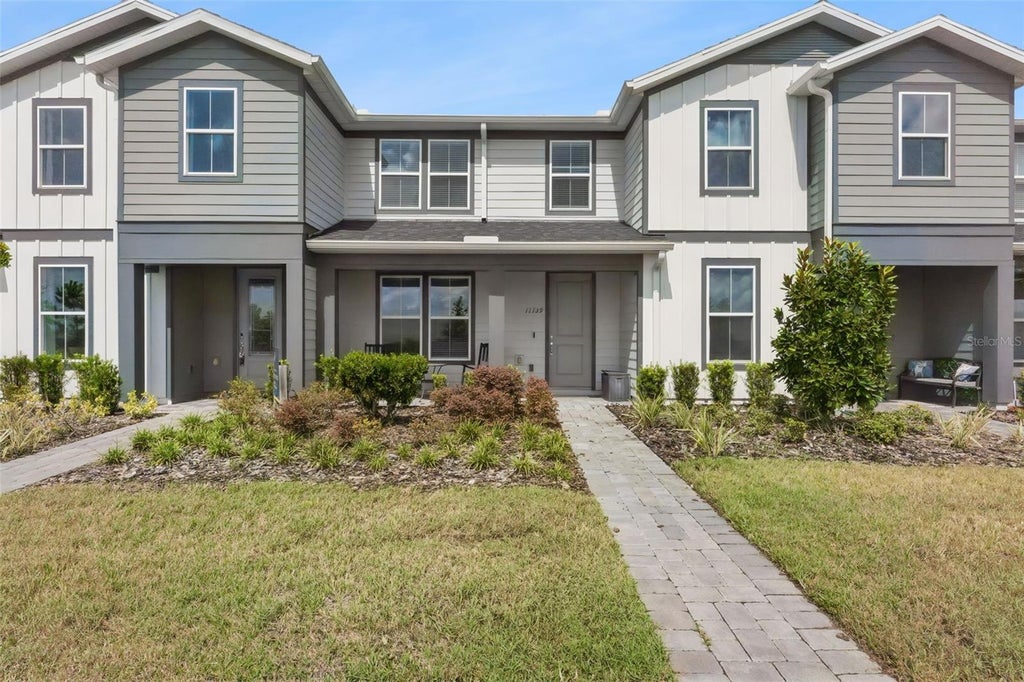 Photo of 11139 Rising Sun Street, Orlando, FL 32829 (MLS # O6443620)