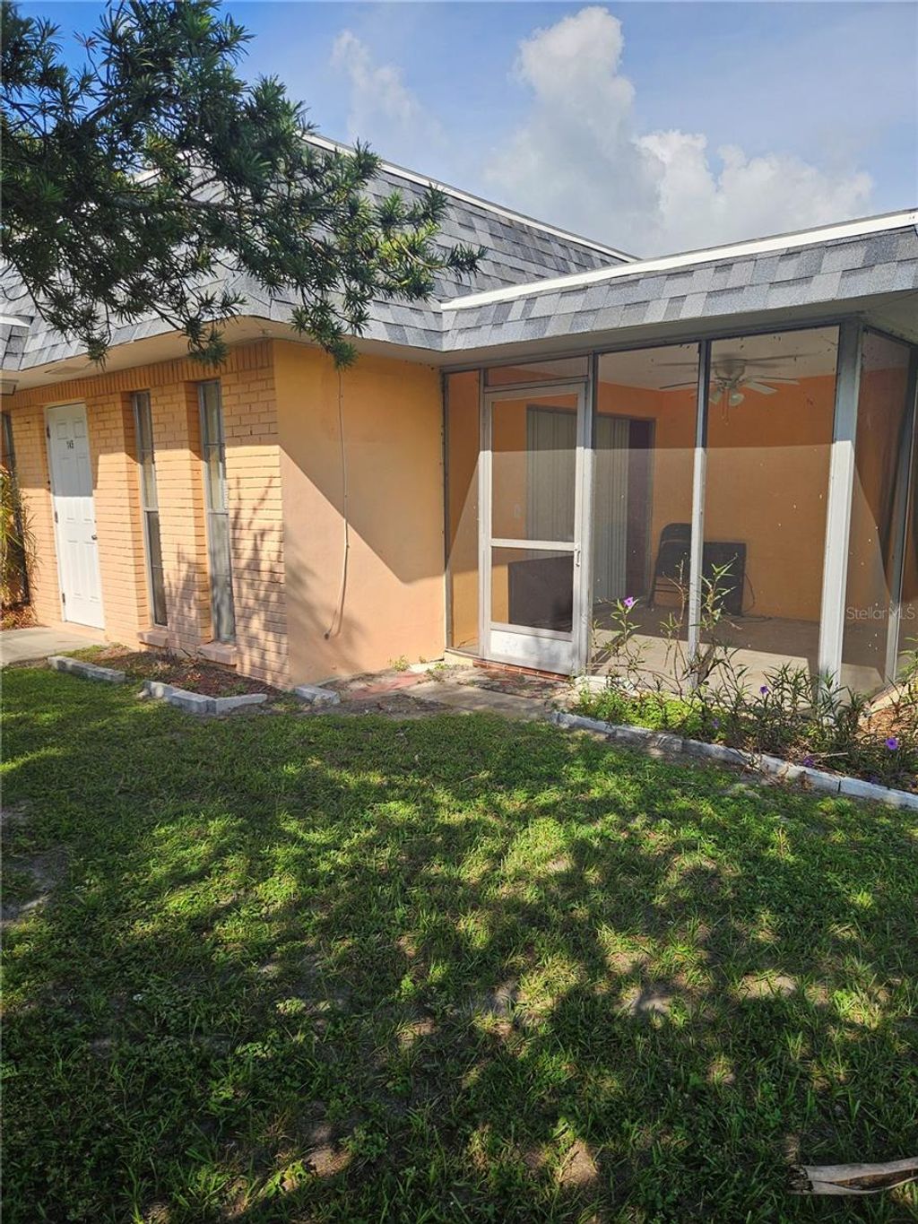 Photo of 145 New York Ave, Dunedin, FL 34698 (MLS # TB8436854)