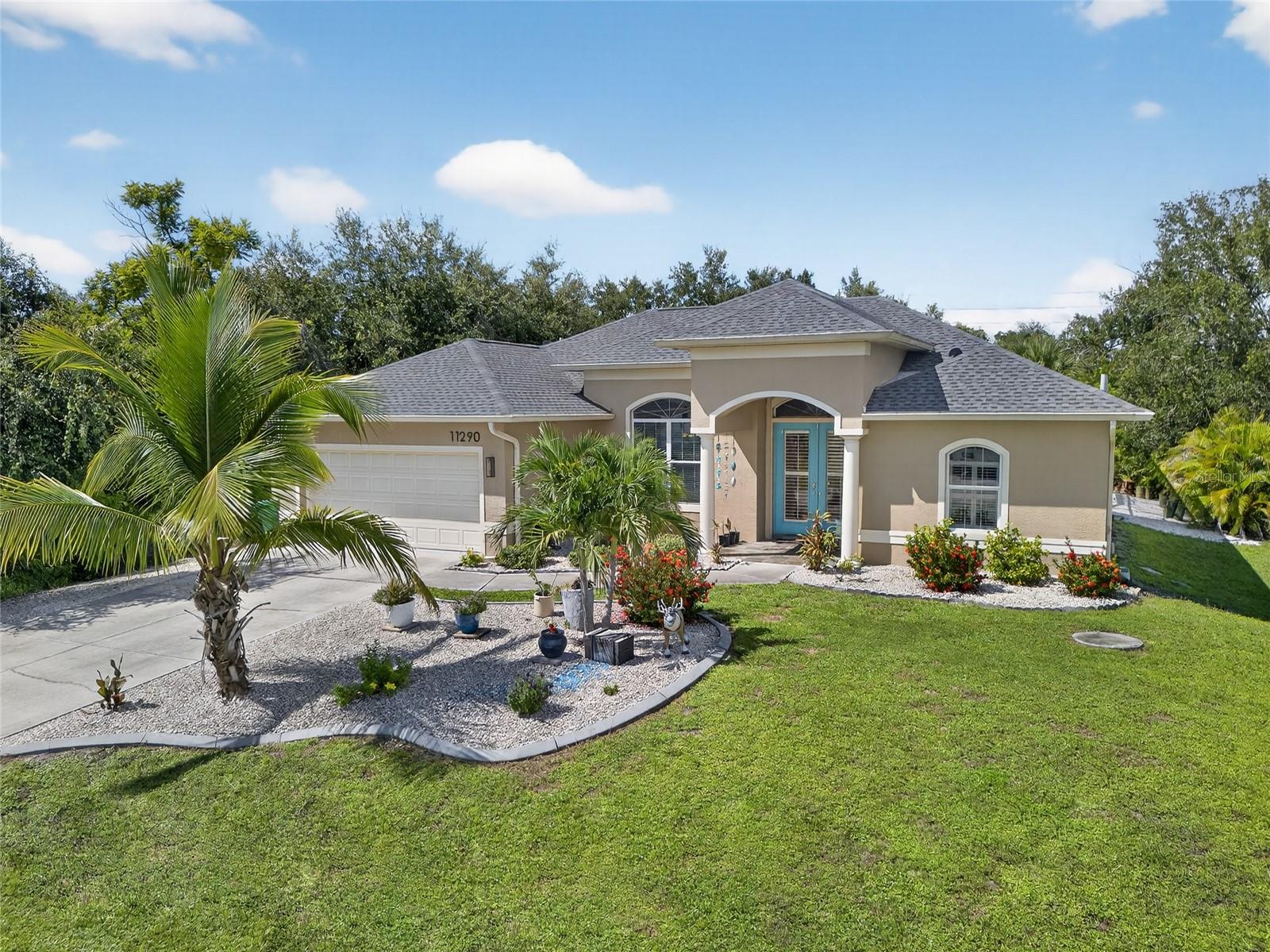 LOADED WITH UPGRADES! 3-BEDROOM, 2-BATH, 2-CAR GARAGE POOL HOME IN PORT CHARLOTTE OFFERING CONTEMPORARY FEATURES AND MODERN COMFORTS!
As you step through front entry, you’re greeted with the grand entrance highlighting 12-foot ceilings looking out to pool views. The open floor plan is accentuated by volume ceilings, an abundance of natural light, elegant crown molding, plantation shutters, ceiling fans, all finished with neutral décor. Every room in the house boasts all-tile floors and 8-foot doors, enhancing the spacious and airy ambiance.
The heart of this home is the kitchen, which features quartz countertops, a stylish backsplash, stainless appliances, center island and breakfast bar, all complemented by a casual dining nook for relaxed meals.
The family room is a standout feature with its double tray ceiling and shiplap wall with electric fireplace as the focal point, always a hit with friends. The split floor plan ensures privacy, with the primary suite offering a tray ceiling, custom wall accent, pool access, his and hers walk-in closets, and private bath with dual sinks and a Roman shower. Two additional guest bedrooms and a separate bath complete the interior living spaces.
Entertain family and friends in your tropical secluded pool area, added in 2019, featuring screened heated saltwater pool with waterfall feature and beach deck, all surrounded by beautifully landscaped grounds and mature and tropical trees. The exterior boasts shell stone landscaping and a wooded backyard for added privacy. This home is meticulously maintained with upgrades and features including a new roof in 2023, new hot water heater in 2024, a brand-new compressor in the A/C, electric hurricane shutter over front door and 5’ x 7’ outdoor shed providing extra storage space. Great location close to a wide variety of dining and shopping, numerous golf courses close by, sandy beaches, boating and world-class fishing at Boca Grande. This home has it all! Schedule your private showing today!