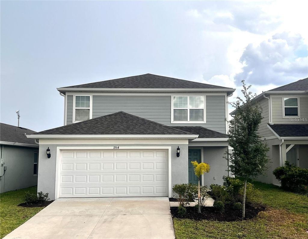 Photo of 1954 Enchanting Ct, Davenport, FL 33897 (MLS # O6401862)