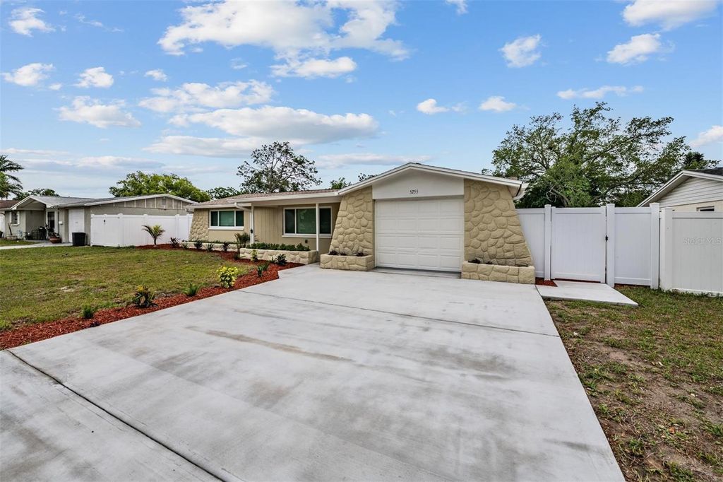 Photo of 5255 School Road, New Port Richey, FL 34653 (MLS # TB8494770)