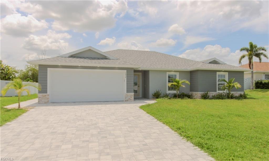 Limited-Time Builder Incentives! Receive up to $10,000 toward closing costs with a full-price offer using the builder’s preferred lender (terms apply). Built by Synergy Homes, this brand-new Biltmore W/C model in Cape Coral combines modern style, smart functionality, and long-lasting construction. Featuring 4 bedrooms, 2 bathrooms, and a thoughtfully designed open floor plan for comfort and convenience. This home is connected to city water and sewer and sits in an X flood zone—meaning no required flood insurance for mortgage buyers. The home is built to withstand Southwest Florida conditions with a monolithic, steel-reinforced 2500-psi concrete foundation, 30-year architectural shingles, and exterior wall insulation. It's a home built to last—engineered with both safety and energy efficiency in mind. Step inside to enjoy light-filled living spaces, contemporary finishes, and durable upgrades like epoxy-coated garage and lanai floors. The primary suite includes a walk-in closet and a spa-like bath with dual sinks and a dual-head shower, creating a luxurious and practical retreat. The kitchen comes fully equipped with stainless-steel appliances—including a refrigerator, dishwasher, microwave, and range—so you can move right in. Enjoy Florida living on your spacious 10x16 under-truss lanai, with room to add a pool and create your perfect backyard escape. The home also includes a full Builder’s 2-10 warranty for added peace of mind. Conveniently located near shopping and dining, this home delivers exceptional value in a growing area at a competitive price. Act now—homes with this combination of incentives, quality construction, and location don’t last! Call today to schedule your private showing and make this incredible home yours.
