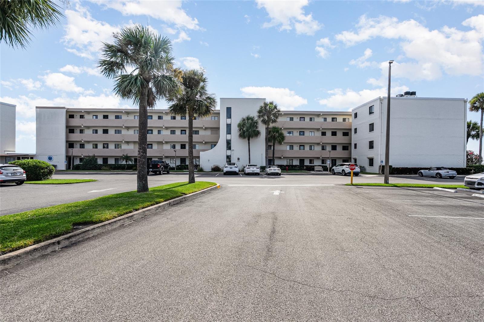 Welcome to your dream waterfront condo, perfectly situated on the 3rd floor with breathtaking direct views of rocket launches! This immaculate 2-bedroom, 2-bathroom unit boasts a glass-enclosed porch with sliders, allowing you to soak in the stunning scenery year-round. The primary bath features a walk-in shower, adding to the condo's appeal. Located in a secure gated complex, residents can enjoy a host of amenities, including a heated community pool, a clubhouse for social gatherings, tennis courts, and shuffleboard for endless entertainment. Recent upgrades include a new sea wall installed in 2024, ensuring peace of mind. With condo fees covering water, sewer, trash, cable, and internet, this property is not just a home but a lifestyle. Move-in ready and neat as a pin, this condo offers everything you need to relax and enjoy waterfront living at its finest. Don't miss out on this exceptional opportunity!