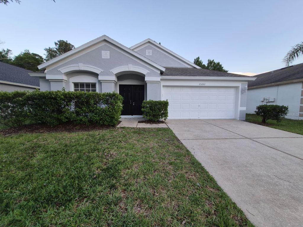 Photo of 25202 Lexington Oaks Boulevard, Wesley Chapel, FL 33544 (MLS # TB8496875)