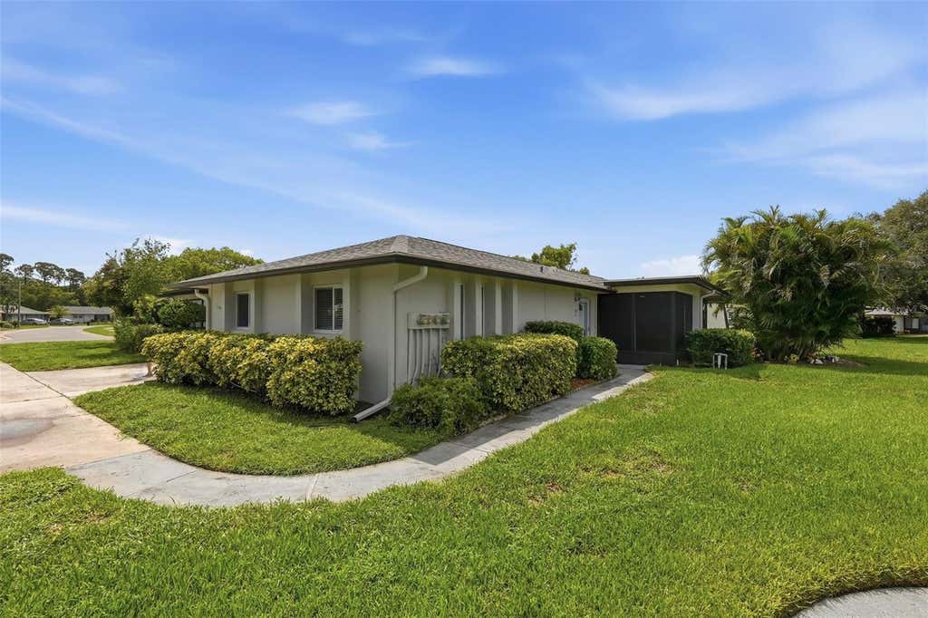 Photo of 1339 Queen Anne Drive #C, Palm Harbor, FL 34684 (MLS # TB8535599)