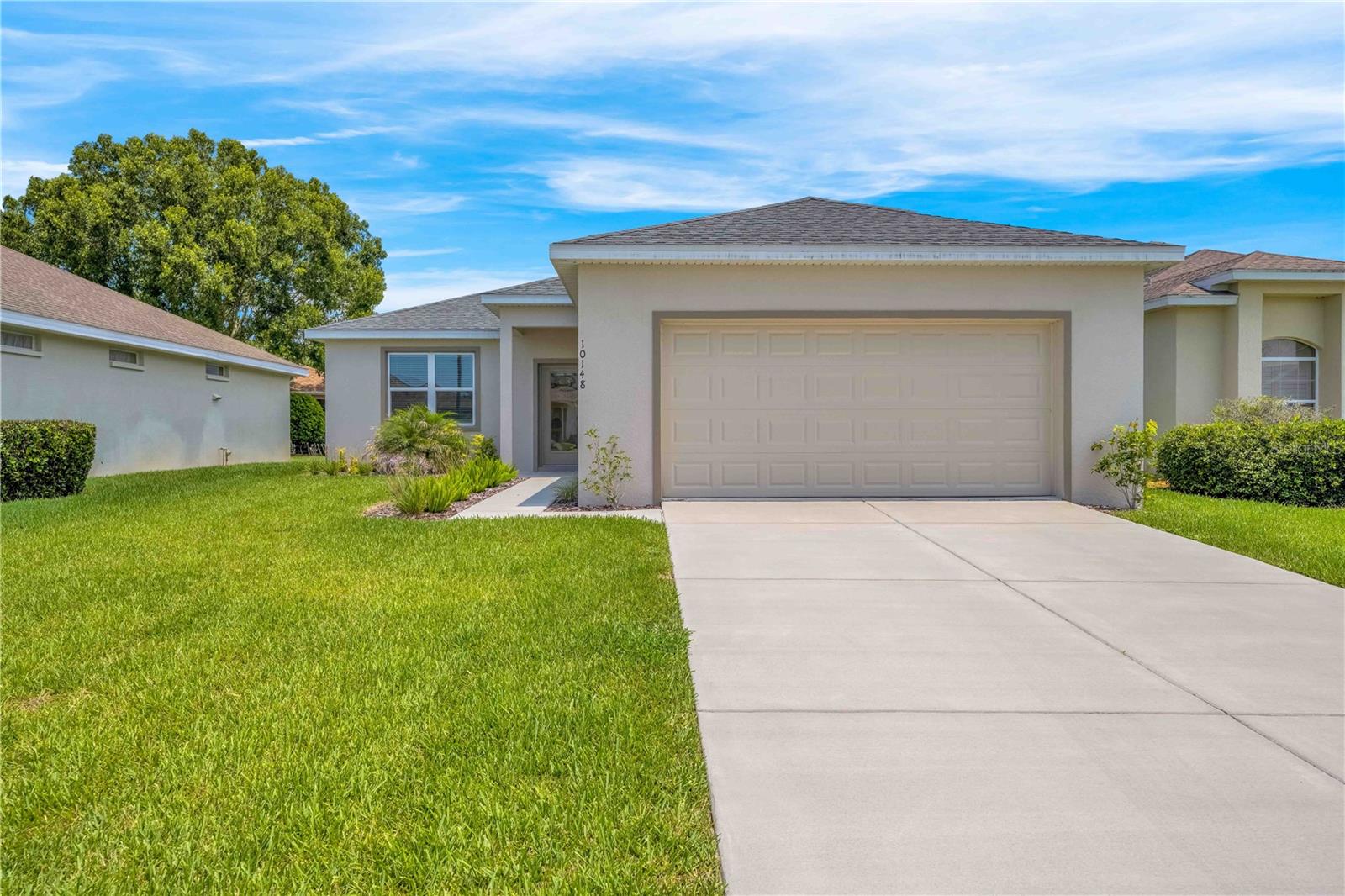 One or more photo(s) has been virtually staged. Ready for Immediate Occupancy! Seller is offering $5,000 to be used toward the buyer’s closing costs and prepaids, or applied toward the first year of HOA dues! This brand-new 3-bedroom, 2-bathroom home with a 2-car garage offers 1,550 sq ft of living space (2,069 total) and is located in the highly sought-after gated community of GlenLakes Country Club! Step inside and be welcomed by a spacious, open layout ideal for modern living.
The kitchen boasts rich wood cabinetry, granite countertops, stainless steel appliances, a breakfast bar that seats three, LED lighting, and beautiful, easy-to-maintain flooring that runs throughout the entire home. The bright and airy living room includes sliding glass doors that open to the backyard.
Enjoy the convenience of an indoor laundry room, complete with washer and dryer. The generous primary suite features a walk-in closet and a private bath with dual sinks, a tub/shower combo, wood vanity, and sleek LED lighting. Two additional bedrooms are located near the guest bath, which includes granite counters, tile-surround tub/shower combo, and matching cabinetry.
This home is nestled within GlenLakes, home to a stunning 18-hole championship golf course and a vibrant clubhouse offering a full-service restaurant and the popular 19th Hole Grill & Bar. Gated community with 24/7 security for peace of mind. Conveniently located near major shopping centers, restaurants, and everyday essentials.
Drive your golf cart to the many amenities: fitness center, tennis and pickleball courts, lakeside pool and spa, game and card rooms, billiards, library, yoga studio, dog park, playground, and Veterans Memorial. With over 100 clubs and social groups to join, there’s always something to enjoy!
Located just 1 hour from Tampa, and close to beaches, Pine Island sunsets, boating, fishing, kayaking, and more. HOA dues include cable and internet for added value and convenience!