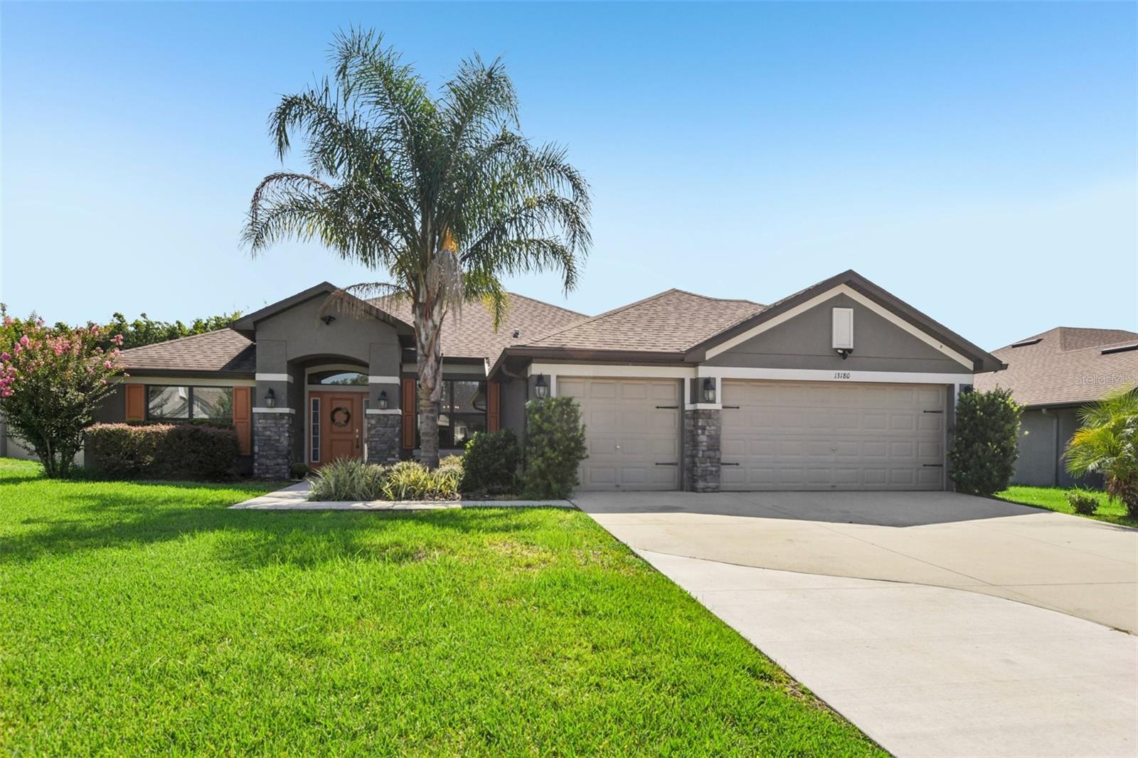Under contract-accepting backup offers. Welcome to Summerfield, where comfort meets style in this stunning 4-bedroom, 3-bath pool home. Designed with modern living in mind, this residence blends tasteful finishes with thoughtful upgrades, offering the perfect setting for both everyday living and entertaining.
Inside, you’ll immediately notice the bright, open layout enhanced by 10-foot ceilings and wide living spaces that flow effortlessly together. The kitchen serves as the heart of the home, featuring crisp white cabinetry, granite counters, stainless appliances, and a designer backsplash. A spacious bonus room near the entry adds flexibility, ideal for a home office, media room, or even a potential 5th bedroom.
The private primary suite offers dual walk-in closets, double vanities, and a spa-like shower with direct access to the lanai. Three additional bedrooms, abundant storage, and a versatile laundry room round out the interior. The garage has been transformed into a functional workshop, while the extended driveway ensures plenty of parking.
Outdoors, you’ll find your personal retreat. The large covered lanai overlooks a custom saltwater pool with a sun shelf, umbrella stand, and oversized heater, perfect for year-round enjoyment. A full vinyl fence surrounds the yard, providing both privacy and space for pets, gardens, or play.
With curb appeal enhanced by stone accents, a sprinkler system, and seamless gutters, this home is truly move-in ready. Skip the wait for new construction and start your Summerfield lifestyle today.