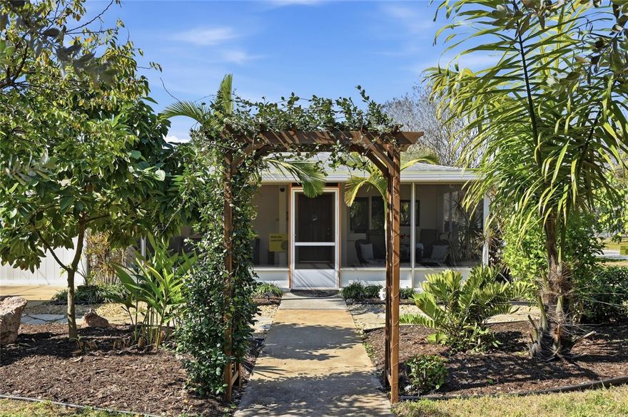 Perfectly positioned on a corner lot in the beloved Gulfport Arts District, this thoughtfully upgraded 1957 residence offers something rare — a home where everything has already been done, so you can simply arrive and begin enjoying life.

Just steps from local restaurants, galleries, and shops, and only a short stroll to the beach, parks, and library, this is a neighborhood designed for connection, creativity, and easy living. Here, mornings might begin with a walk to Sumitra café, and evenings end with a sunset dinner and live music at O'Maddy's, shared among friends.

A Home That Feels Effortless

Inside, the home welcomes you with warmth and simplicity. Original wood floors have been beautifully refinished, carrying a sense of character without the upkeep of older homes. The open kitchen, updated with new appliances, is as functional as it is inviting — perfect for quiet meals or hosting family when they visit.

The fully screened front porch becomes an everyday luxury — an extra 416 square feet of breezy, shaded living space where you can dine, relax, and enjoy the landscaped surroundings without worry.

Peace of Mind, Built In

What truly sets this home apart is what you don’t have to think about.

Over $125,000 in upgrades have been completed with long-term comfort in mind. From a fully modernized electrical system and updated plumbing to reinforced structural supports and a sealed crawl space, the essential systems have been carefully addressed.

Energy-efficient features like solar panels and added insulation help keep monthly costs predictable, while the home’s history of no flood intrusion offers an added sense of confidence.

Hurricane-impact windows, roof reinforcements, and additional protections mean you can enjoy coastal living with greater peace of mind.

Space for Family, Hobbies, and Flexibility

The expansive bonus room offers a private, welcoming space for visiting family or extended stays, complete with its own entrance, wet bar, and fireplace. Connected to a bedroom and full bath, it creates a comfortable, semi-private suite — ideal for guests or even a live-in arrangement if desired.

An enclosed, insulated garage provides flexible space for whatever brings you joy — whether that’s a home gym, workshop, or art studio.

A Backyard That Invites You to Slow Down

"Outdoors, the property transforms into a personal sanctuary... A peaceful walking labyrinth adds a unique touch—a place for reflection, movement, and calm. Inquire about additional amenities and interior furnishings that may be available to stay with the home to make your move-in truly seamless."

Practical Comfort, Thoughtfully Designed

A powered utility shed provides space for tools, hobbies, or storage, keeping everything organized without cluttering your living areas.

This is more than a home — it’s a place designed to make life easier, richer, and more enjoyable.
A place where the work has been done… and the living can begin.