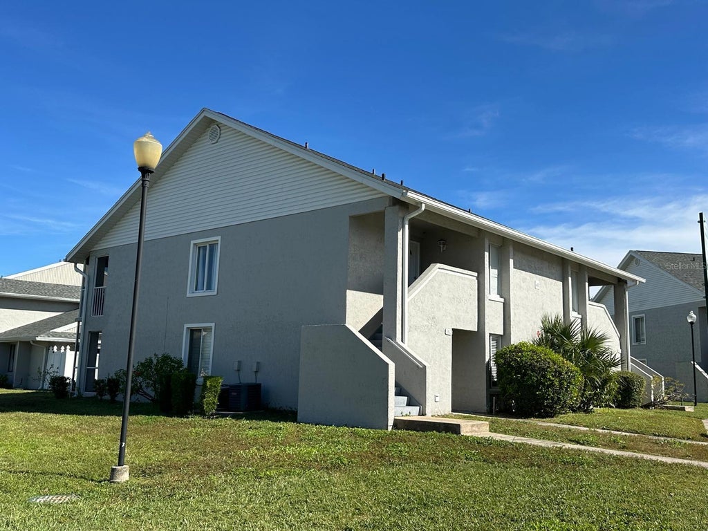 Photo of 5613 Blue Shadows Court #60-2, Orlando, FL 32811 (MLS # O6416784)