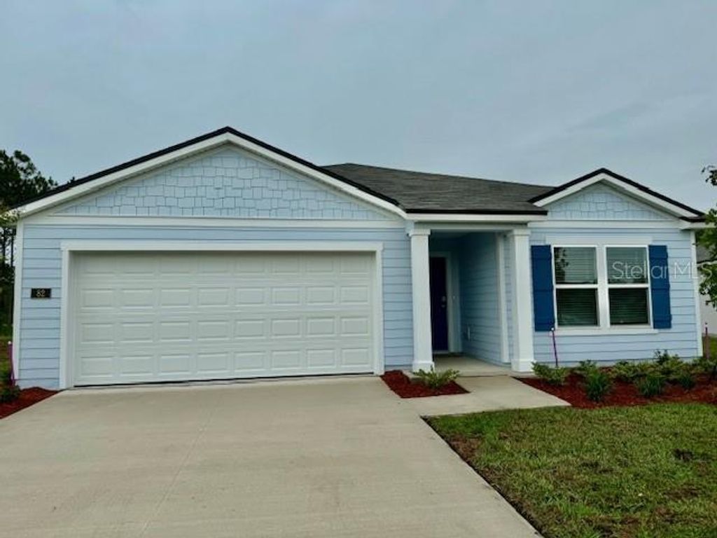 Photo of 82 Hulett Woods Road, Palm Coast, FL 32137 (MLS # FC299345)