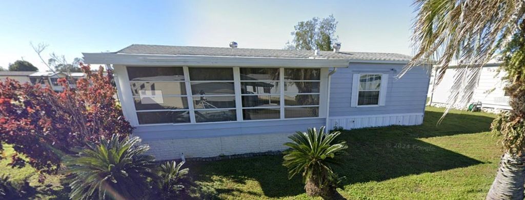 Photo of 6433 Jacaranda Avenue NE, Winter Haven, FL 33881 (MLS # S5144807)