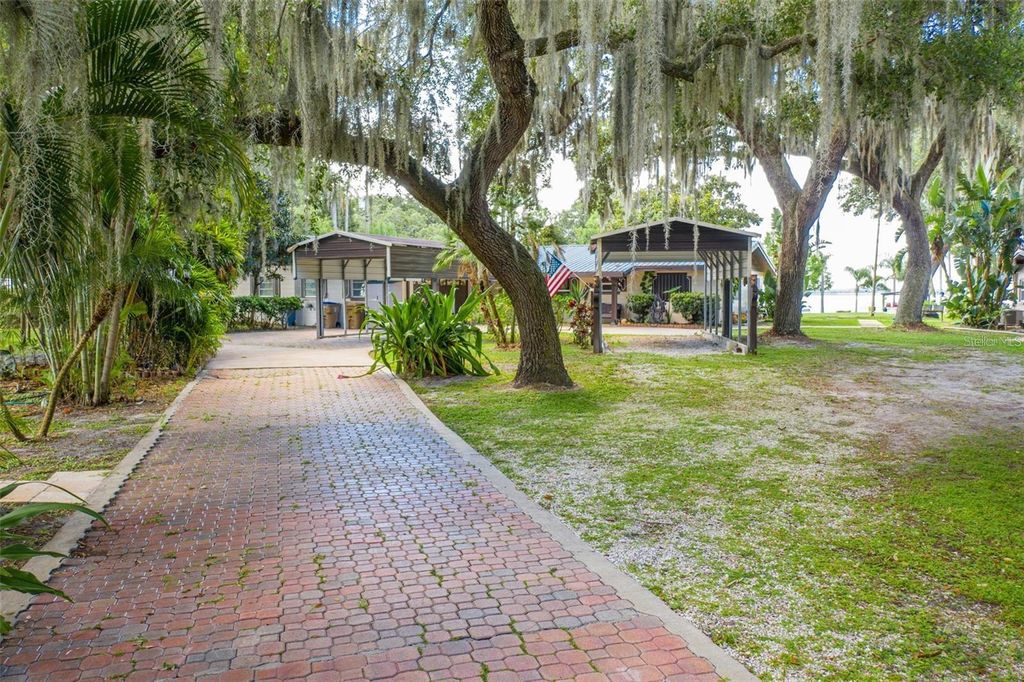 Photo of 5870 Alligator Lake Shore W, Saint Cloud, FL 34771 (MLS # S5143297)