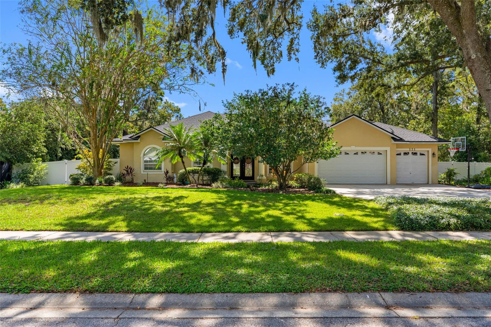 Your LUTZ Oasis awaits!  Salt water POOL/SPA home on CONSERVATION.  4 Bed, 3 Bath with Office/Flex (or 5th bedroom).  3,220 SF home on almost .5 acre!  Private backyard retreat includes large pergola with swing and pavered fire pit area. Lots of updates - 2024 Roof (10 year warranty), 2024 Water Softener, 2024 LVT flooring, 2024 interior paint, 2025 salt water cell for pool.  One A/C replaced in 2025 (10 year warranty, maintenance contract), other unit inspected and in good condition.  Large kitchen with plenty of bar space features stainless steel appliances (2025 refrigerator), natural gas stove, island with power (not pictured), wine cooler, built-in wine rack, recessed and pendant lighting.  Single story and no carpet!  Granite counters in all bathrooms, double vanities in Master and Guest bathroom.  Washer and dryer stay in the laundry room with utility sink.  3-car garage with storage shelves and bonus refrigerator.  Pavered porch and entrance way,  double entry doors with leaded glass, crown molding, irrigation system, white vinyl fence with two gates, gutters, pool/spa heater, mature oaks and landscaping.  Escape the congestion in beautiful Lutz with easy access to I-275, Carrollwood, USF, and more.  Full Pier System remediated sinkhole (2016) with lifetime warranty, inspected in 2024 to confirm the work remains sound and there were no new concerns.  All reports and warranty attached.