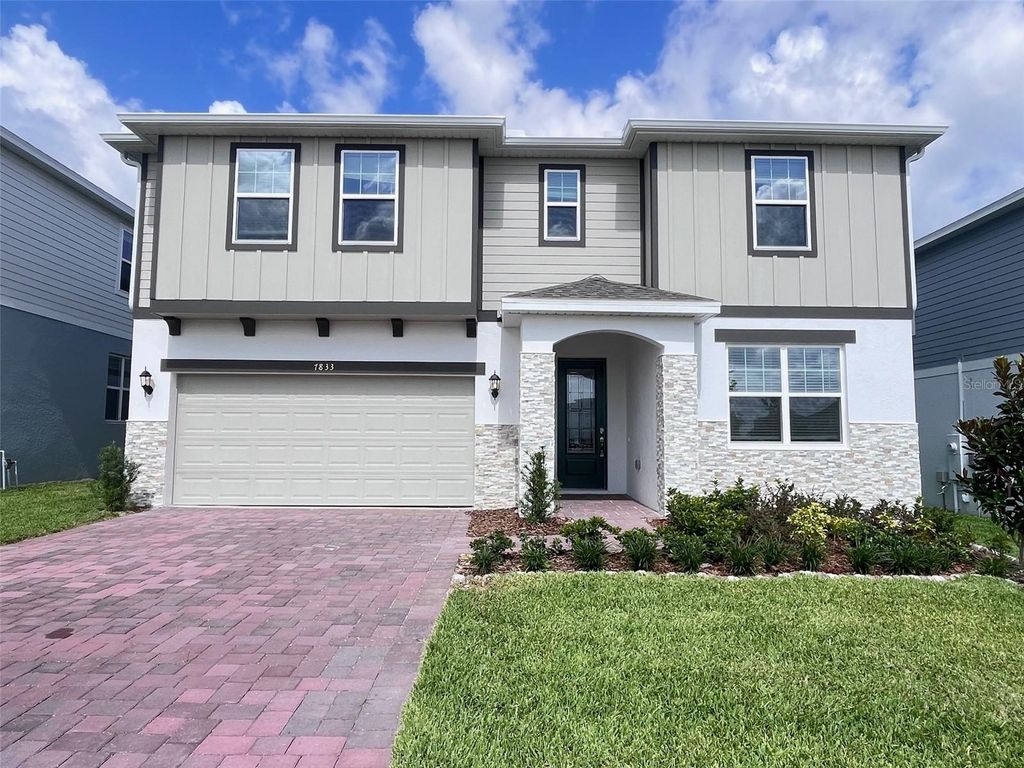 Photo of 7833 Trapani Loop, Clermont, FL 34714 (MLS # O6402007)