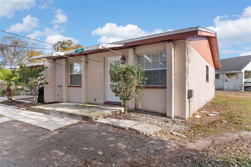 Photo of 704 W Alamo Drive, Lakeland, FL 33813 (MLS # TB8463540)