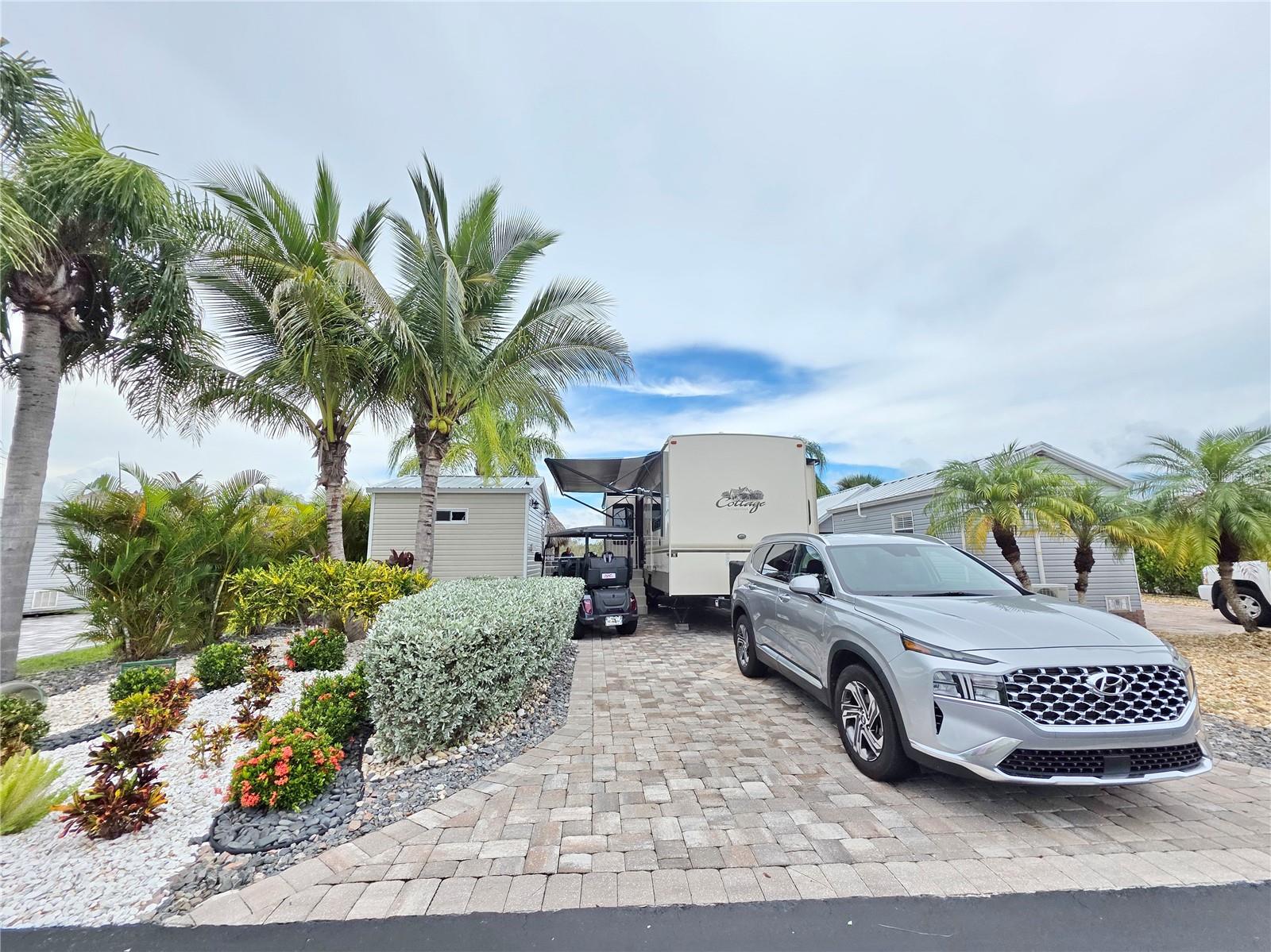 SILVER PALMS RV 5 STAR RESORT - This beautiful property is on the Preserve teeming with wildlife. It has pavers, Casita (finished and furnished) and a Tiki Hut. The Casita has a bathroom, washer dryer, refrigerator, sleeper sofa. The bathroom has a barn door and it has AC. The golf cart is included in the package. Tiki is 12 x 14 with TV and comes furnished. The Casita is is 10 x 12, 2023. This is an active community with Pool, Jacuzzi, pickle ball, Tiki Bar, Shuffleboard, and so much more.
The RV Cedar Creek - 2018, can be purchased for an additional $25,000.