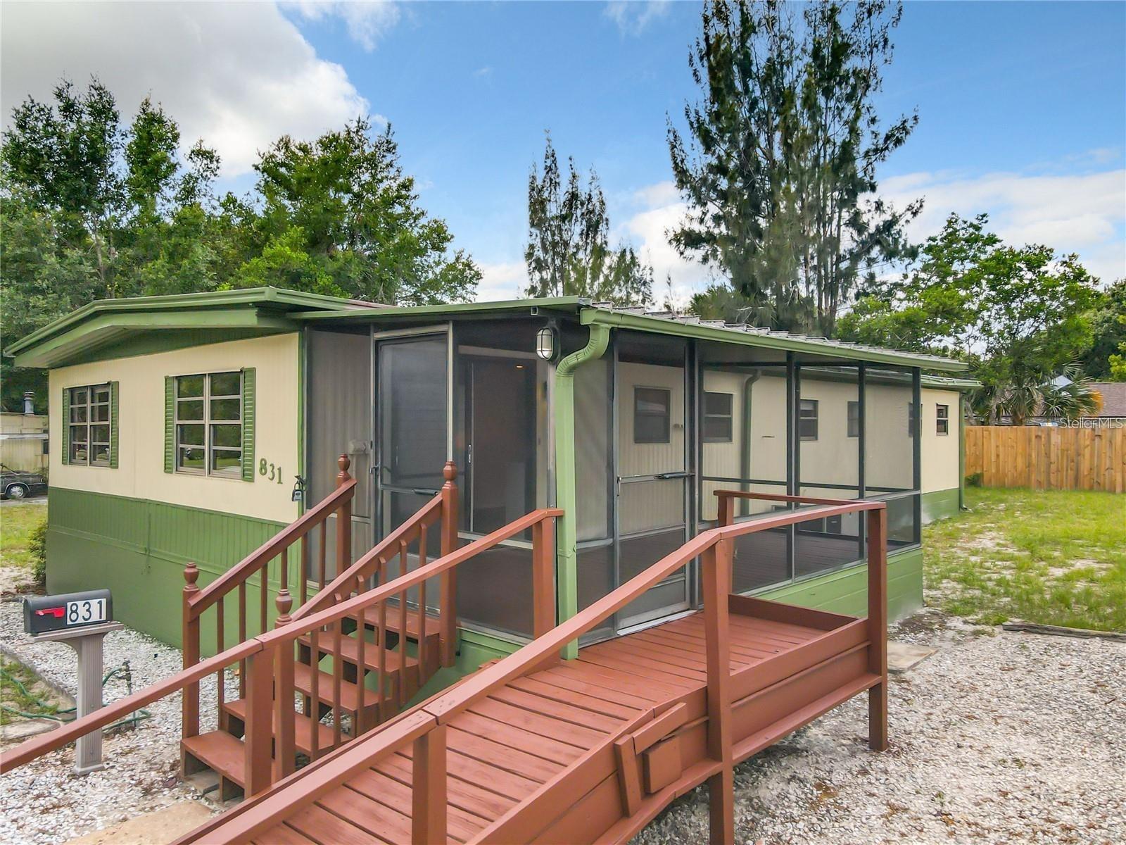Welcome to this beautifully updated home in the Lake Kathryn neighborhood of Casselberry—featuring a fully permitted 1BD/1BA detached accessory dwelling unit (ADU), completed in 2025.The main home offers 3 spacious bedrooms, 2 full bathrooms, and a bonus room perfect for a home office or flex space. You'll love the natural light, new waterproof vinyl plank flooring, and fresh interior and exterior paint (2024), creating a modern and welcoming space. The expansive primary suite includes double doors, two closets,and a Jack-and-Jill bathroom connecting to a secondary bedroom. The large eat-in kitchen opens to a spacious living room and a screened-in wood deck lanai, perfect for relaxing or entertaining year-round. Additional highlights include an indoor laundry room, a tankless water heater (2025), a wheelchair-accessible ramp, ample off-street parking, and a fully fenced oversized 0.23-acre lot—offering plenty of outdoor space for recreation, storage, or future possibilities. The detached 400 sqft ADU, completed in 2025, features a mini-split A/C unit, full bathroom, and an open layout—ideal for multi-generational living, guests, or rental income. Located just minutes from SR 434 and Seminole Blvd, with convenient access to Publix, shopping, dining, parks, Wekiwa Springs, and top-rated Seminole County schools. Under an hour from Florida’s east coast beaches and major attractions like Disney and Universal.No HOA. Updated in 2024 and 2025. Lake Kathryn location. Move-in ready with income potential. Schedule your private showing today.