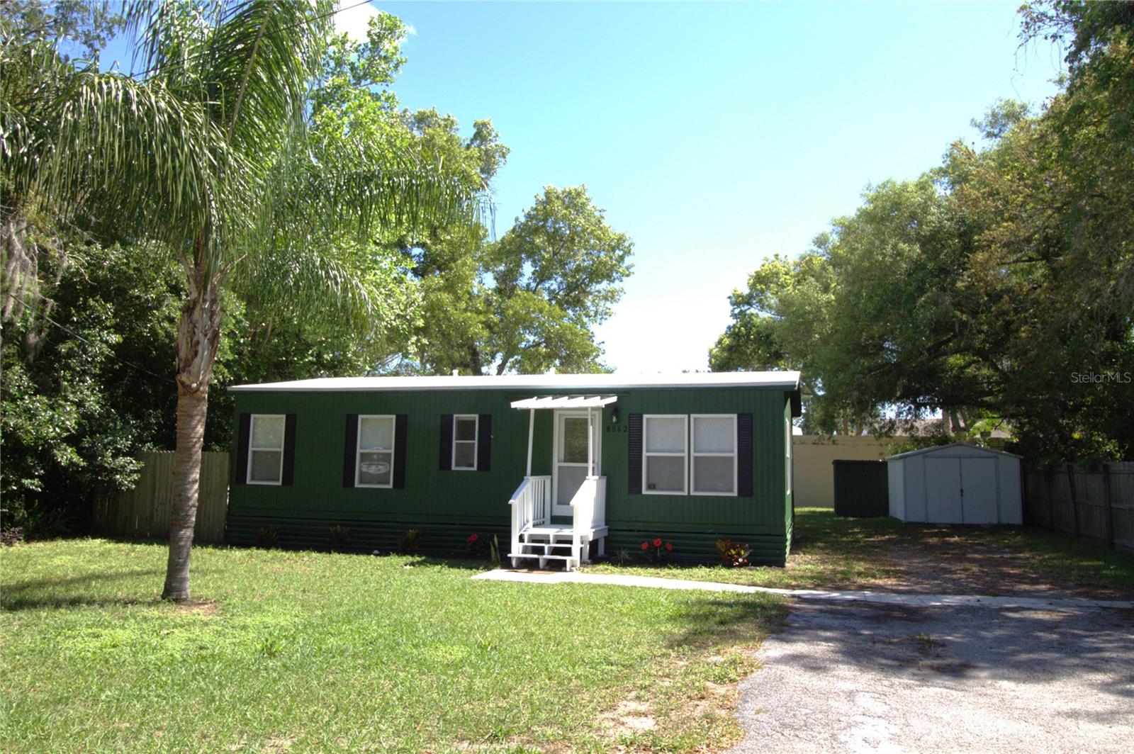 Are you in search of a charming home that has been meticulously maintained and has some nice updates? Look no further!! This 2 bedroom 2 bathroom home has a new roof, newer double pane windows, updated HVAC system, newer appliances, renovated master bathroom, newer commodes, updated plumbing, newer tile floors and sub flooring, updated energy efficient fixtures and fresh paint inside and out. Relax by the fire pit in your private backyard or enjoy a beverage inside from your coffee bar. You'll have plenty of storage inside and out with the decorative wall of cabinets in the dining area and the large shed (with footers). Additional features include an inside laundry area / mud room and a spacious oversize driveway. This little gem sits right in the heart of town within minutes to everything yet feels like your miles away! Schedule a viewing today to see your new home!