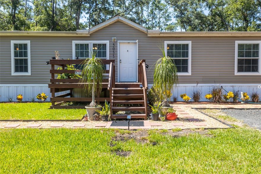 Spacious 5-Bedroom Home on Over an Acre in Flagler Estates!
Discover this beautiful 5-bedroom, 3 full bath home built in 2022, perfectly situated on over one acre in sought-after Flagler Estates. This modern home offers exceptional living flexibility with two separate living areas, ideal for multi-generational living, a home office, or guest space. Enjoy Florida living with a large 18' x 18' screened and covered back patio and a charming 10' x 11' front porch. The home is wired for an external generator and includes security lighting for peace of mind. A new driveway has been installed, and the county recently paved the road, making access easy and smooth. Highlights include: Well water with a softener and full filtration system-Full gutters around the entire home-A wooden patio built with treated lumber-20 fruit trees and raised garden beds for the green thumb-Two sheds, including a spacious 12' x 22' unit. Conveniently located with easy access to Cracker Swamp Road, you're just minutes from Hastings, and centrally located between St. Augustine, Palm Coast, and Palatka.
This property combines rural charm with modern amenities — a rare find in Flagler Estates!