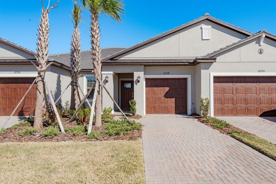 Come see this like-new 55+ villa in Medley at Mirada — move in now without the wait or added cost of new construction! Residents enjoy exclusive 55+ amenities, including a resort-style pool and clubhouse. Your HOA fees also include membership to the incredible 15-acre lagoon, featuring a swim-up bar, kayaking, paddleboarding, obstacle course, waterslides, cornhole, and year-round community events. This 2-bedroom, 2-bath home offers an open-concept layout with a desirable split floor plan. The spacious primary suite features dual vanities, a glass-enclosed shower, private water closet, and a walk-in closet. The kitchen flows seamlessly into the dining and living areas — perfect for entertaining. Step outside to your covered lanai overlooking a peaceful pond. The HOA covers exterior walls and roof, insurance for the structure, lawn maintenance, water, sewer, trash, and cable/internet — making everyday living truly low-maintenance. Conveniently located near shopping, dining, hospitals, I-275, and more, this home is ideal for full-time living or a seasonal retreat. Schedule your showing today and start enjoying resort-style living!