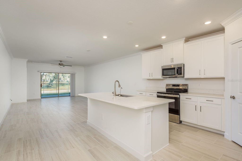 Photo of 10728 Gable Dig Loop, San Antonio, FL 33576 (MLS # TB8469699)