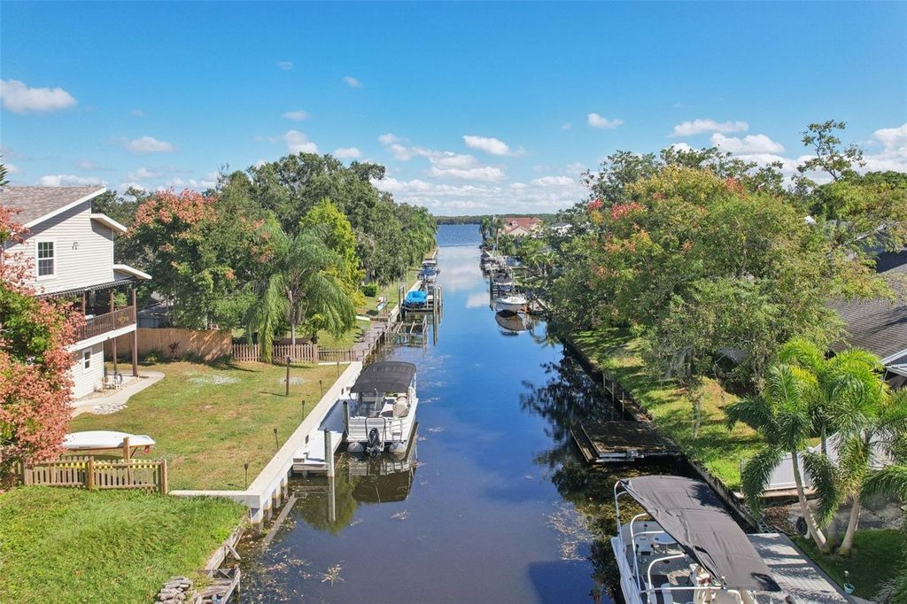 Photo of 3140 N Canal Drive, Palm Harbor, FL 34684 (MLS # TB8441633)