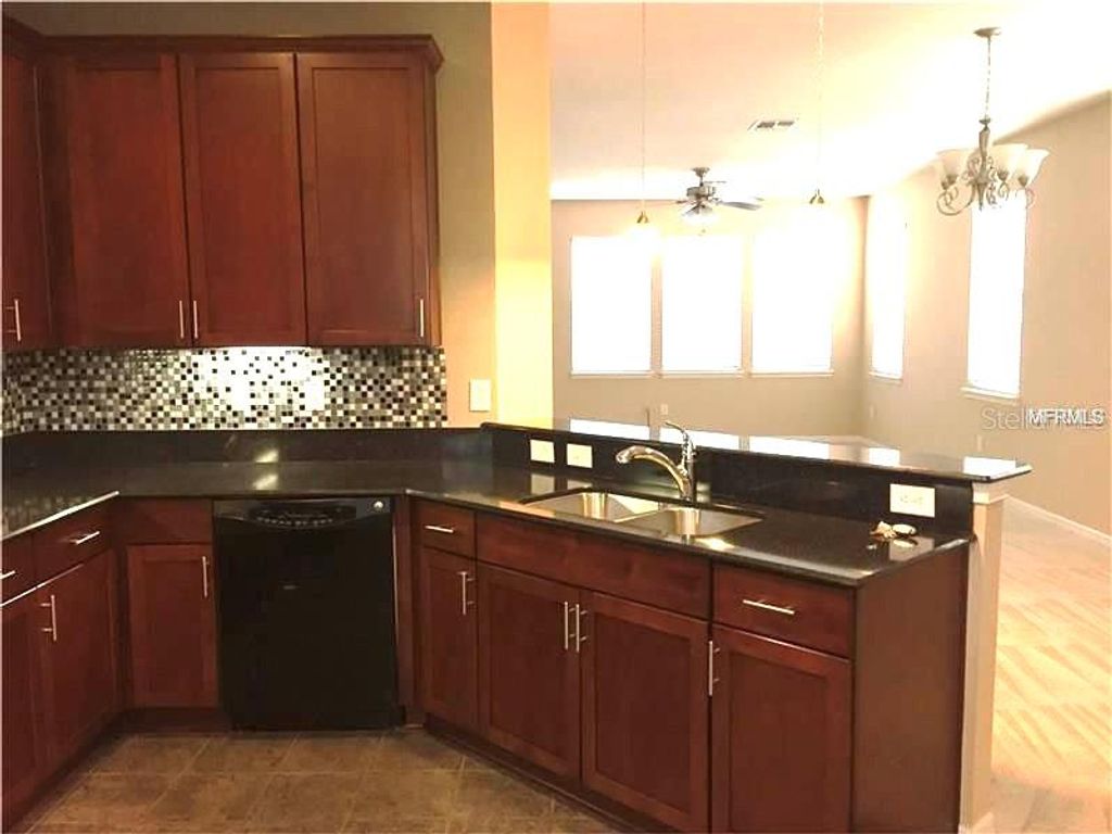 Photo of 12910 Calderdale Avenue, Windermere, FL 34786 (MLS # R4909829)