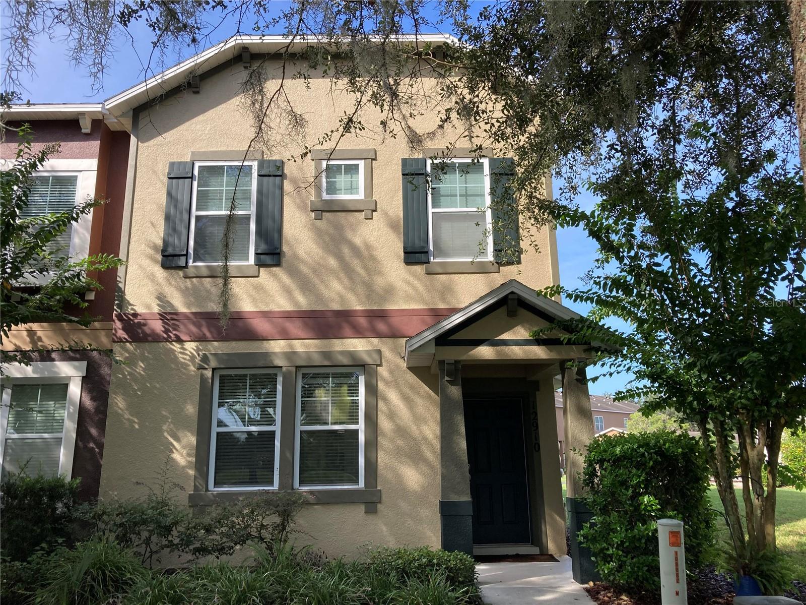Townhome in Wickham Park. End unit with Three Bedrooms, Two and one half baths. Kitchen has 42" wood cabinets, All Appliances, Granite Counter Tops and opens to the Living/Dinning area. All bedrooms are on the second floor, Master suite has a walk in closet with organizer, bath has double vanity and shower. Laundry closet on second floor. The Private courtyard leads to the two car garage. Community amenities include, the clubhouse, pool, playground and walking trail. Close to shopping, Disney and major roads.