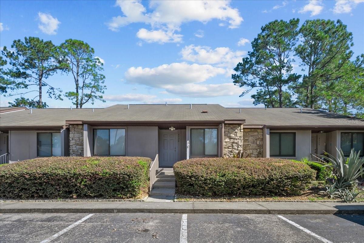 Welcome to Mile Run, one of Gainesville's most desirable communities! This charming 2-bedroom, 2-bathroom flat offers 1,185 sq. ft. of comfortable living space with the perfect blend of convenience and amenities. Inside, you'll find an open kitchen with a breakfast bar and eat-in area, a spacious great room with vaulted ceilings, a cozy fireplace, and skylights that fill the home with natural light. The large laundry room makes daily living easy, and the hallway bathroom features a relaxing jetted tub—perfect after a long day. Enjoy the outdoors on your private covered porch/patio, ideal for morning coffee or evening relaxation. The HOA makes life maintenance-free with pest control and exterior maintenance included. Plus, the community offers an abundance of amenities: clubhouse, pool, playground, tennis courts, racquetball, basketball court, picnic area, and more. Location couldn't be better! You'll be just minutes from Santa Fe College, UF, Shands,VA Hospital, Airport, Publix, Devil's Millhopper,San Felasco Park, and even a nearby skate park. Whether you're exploring local trails or enjoying the vibrant city scene, this home puts it all at your doorstep. Don't miss out on the opportunity to own this rare gem in Mile Run! Whether you're enjoying the tranquility of your private space or the convenience of nearby attractions, this Home offers the best of both worldscomfort and location.